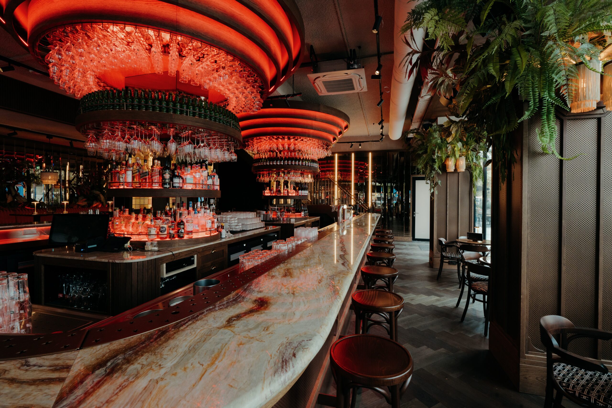 a bar with red lights